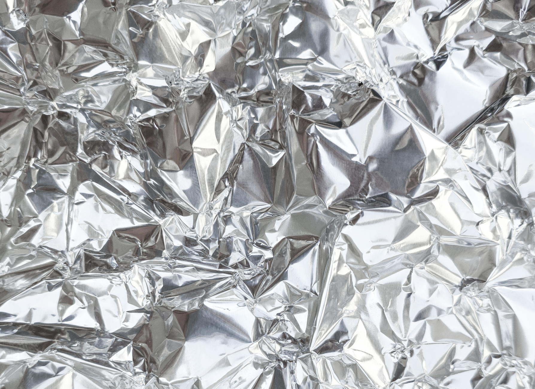 Stopmap foil silver dengan permukaan mengkilap, cocok untuk label keamanan dan identifikasi produk